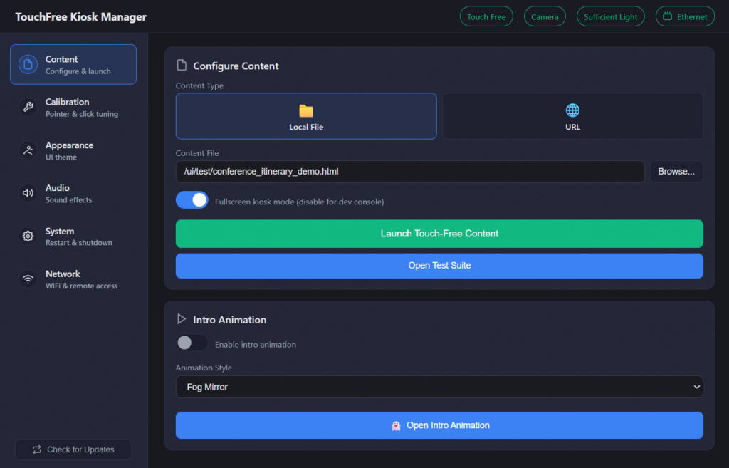TouchFree Kiosk Manager dashboard showing content configuration, calibration, appearance, audio, network, and system controls with real-time status indicators for camera, lighting, and WiFi connectivity